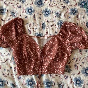 Rust color crop top, size medium.